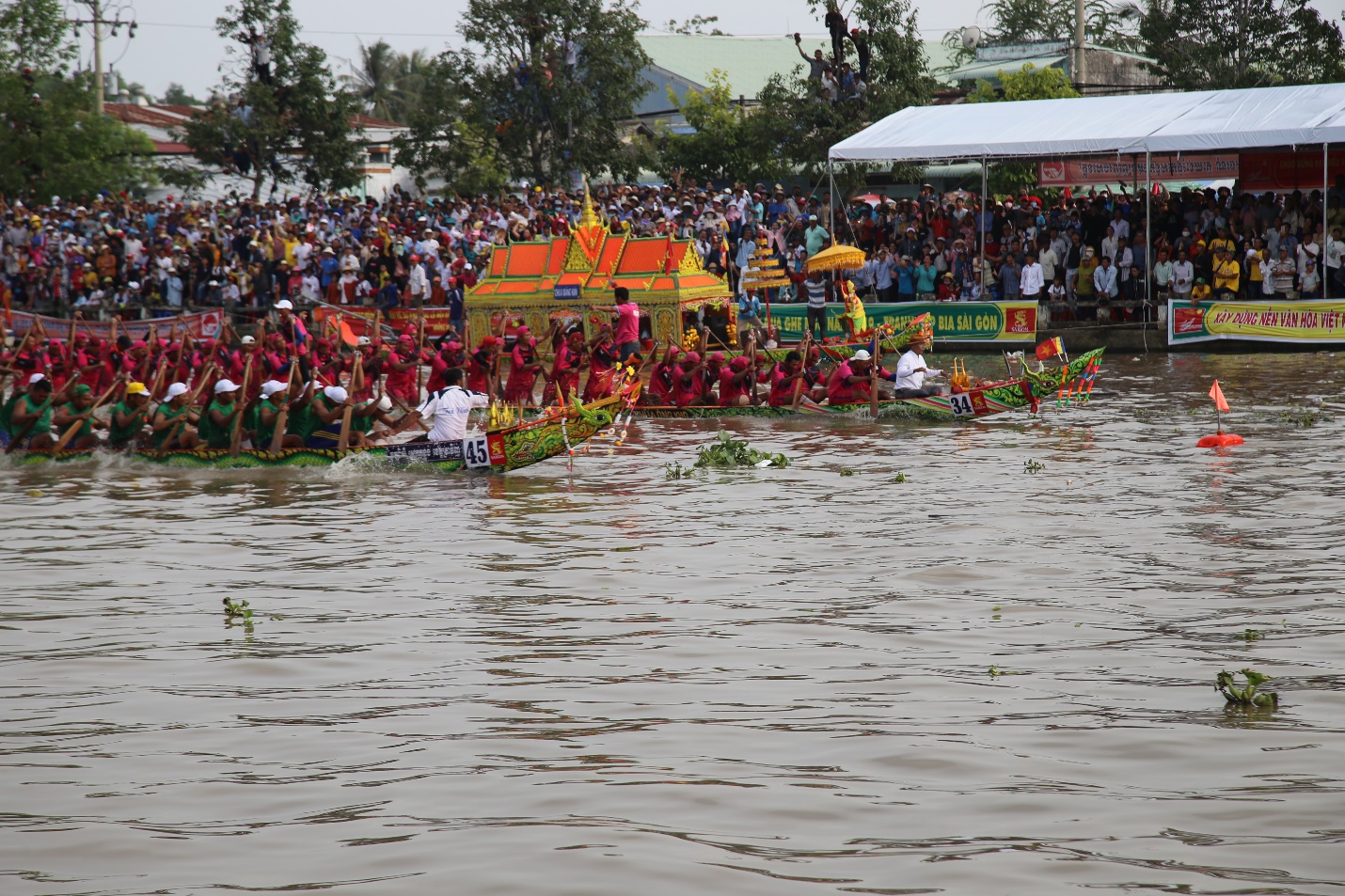Description: A group of people in a large body of water Description automatically generated