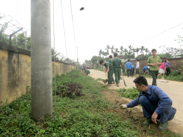 Chuyen bo doi giup dan xoa âdiem denâ rac thai, xay dung nong thon moi hinh anh 2