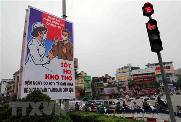 Hoan lai niem vui, gian tien noi buon trong dai dich COVID-19 o Ha Noi hinh anh 2
