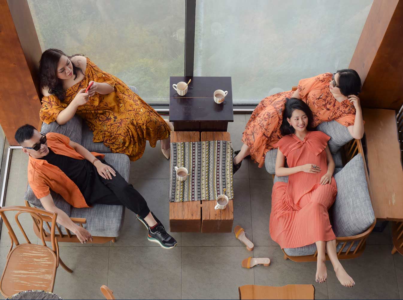 A group of people sitting at a table Description automatically generated