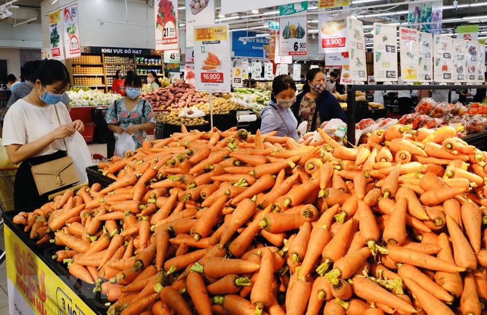 Ha Noi: Nguon cung hang hoa doi dao phuc vu Tet Nguyen dan Tan Suu hinh anh 1