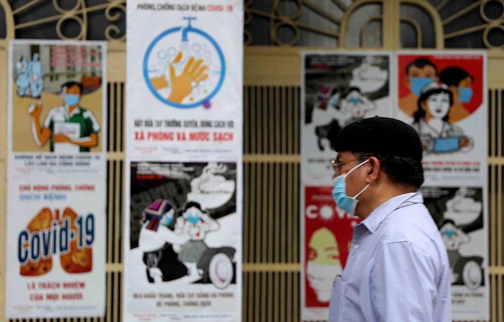 Hoan lai niem vui, gian tien noi buon trong dai dich COVID-19 o Ha Noi hinh anh 1