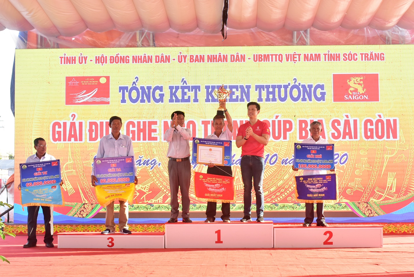 Description: A picture containing person, court, standing, sign Description automatically generated