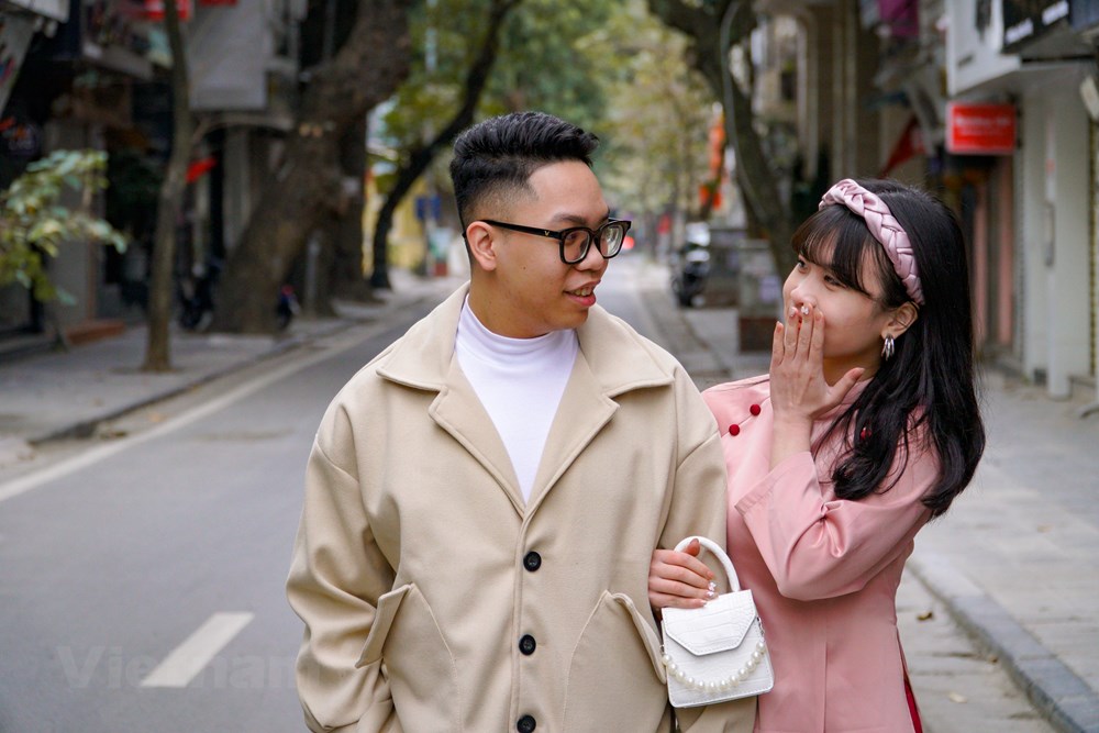 Pho phuong Ha Noi thanh binh trong ngay mung 1 Tet Nham Dan hinh anh 10